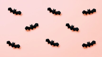 Black Bats on Pink Background for Halloween Decorations and Themes