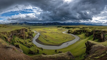 Scenic panoramic view of a winding river through a lush green valley