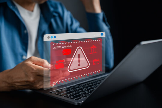 Financial security and system warning with laptop and smartphone, red alert screen risk, fraud, and data protection issues, cybersecurity in online banking.