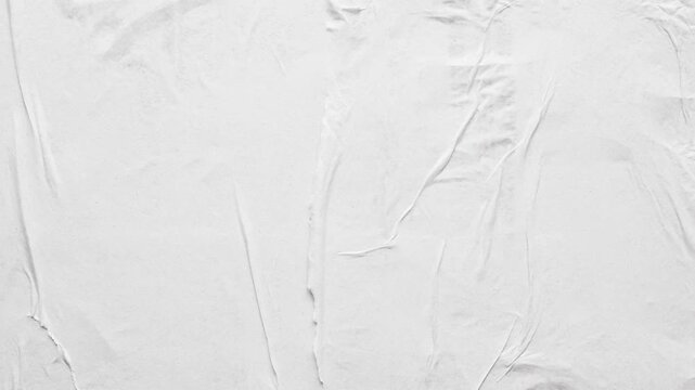 white crumpled and creased glued wrinkled paper poster texture background stop motion