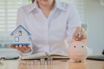 Real estate agents discuss real estate investment and mortgage plans, and provide financial advice...