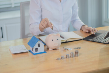 Real estate agents discuss real estate investment and mortgage plans, and provide financial advice...