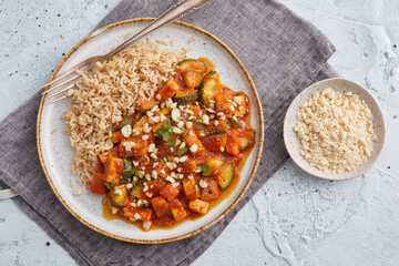 Tofu with chili peanut sauce