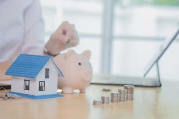 Real estate agents discuss real estate investment and mortgage plans, and provide financial advice...