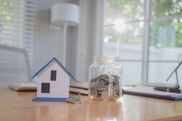 Real estate agents discuss real estate investment and mortgage plans, and provide financial advice...