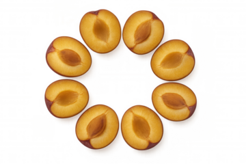 Fresh plum halves forming a circular border, ripe fruit with pits inside, healthy ingredient, transparent background