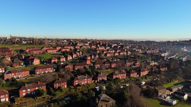 Urban housing in Yorkshire UK. Council houses on town estate, winter morning in a busy city. Dewsbury moor and th town of Heckmondwike