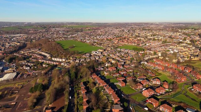 Urban housing in Yorkshire UK. Council houses on town estate, winter morning in a busy city. Dewsbury moor and th town of Heckmondwike