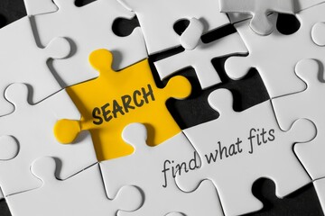 Fototapeta premium Yellow Puzzle Piece Featuring the Word Search with Other Pieces