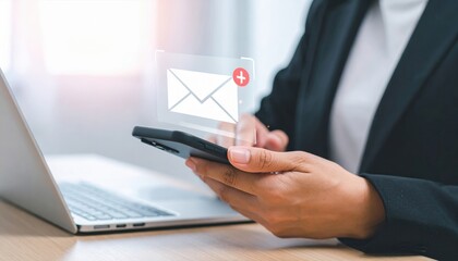 Businesswoman using smartphone to check and manage email notifications. Concept of digital communication, mobile marketing, online messaging, business networking, and professional connectivity.