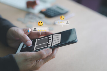 Hand holding a smartphone displaying customer review and rating icons, positive feedback, online shopping experience, and e-commerce success. Concept of business reputation, service quality.