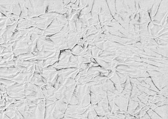 Grey crumpled paper texture background. Stained surface backdrop. For grunge graphic element, creative project, or overlay design.