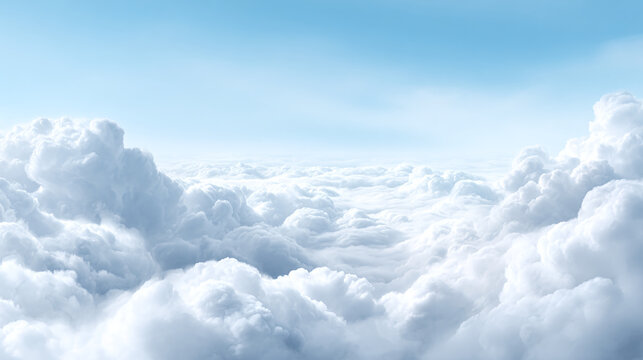 A serene vista of fluffy clouds meeting a soft blue sky, evoking a sense of calm and tranquility, ideal for backgrounds and atmospheric visuals.