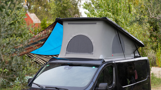 camper in a green outdoor setting