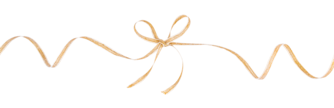 Golden decorative ribbon tied in a bow isolated for festive gift wrapping and holiday design