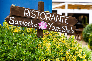 wooden sign in a yoga retreat