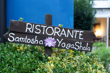 wooden sign in a yoga retreat