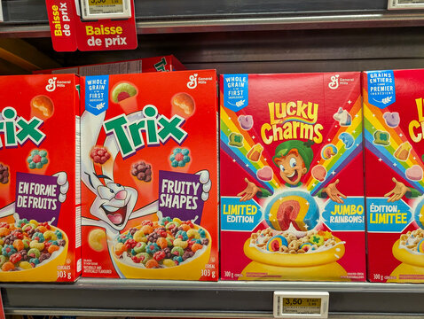 Canada, 20 September 2025 : Colorful cereal boxes on grocery shelf highlighting fruity shapes, marshmallow rainbows