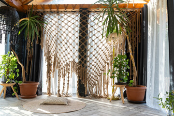 rustic greenhouse living room with tropical foliage for concepts of comfort  serenity and eco-friendly interior