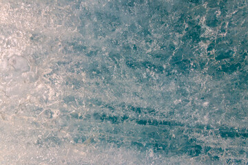 Texture of the ice surface. Winter background