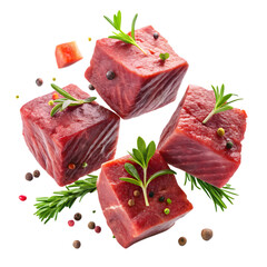Raw beef cubes with rosemary and peppercorns isolated on transparent background