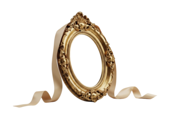 An ornate, oval antique gold picture frame with intricate scrollwork and tarnished gold leaf, elegantly positioned at 45 degrees, beside a delicate, unadorned pale cream silk ribbon, on a clean light