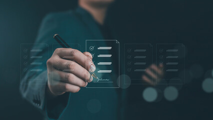Businessman writing and signing digital checklist on virtual screen, representing online approval, electronic document, and paperless workflow concept in modern digital business management.