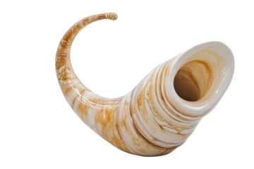Ancient animal horn with intricate patterns isolated on transparent background. Cream horn isolated on white background.
