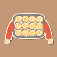 Sticker of hands in oven mitts holding a tray of cinnamon rolls