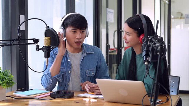 Engaging podcast recording session featuring young hosts in modern studio environment