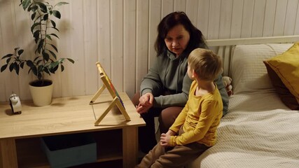 Grandmother playing toys with young grandson indoor. Old woman granny studying with her grandchild at weekend. Senior female having fun with kid. Happy multigeneration family video. Elderly Grandma - Powered by Adobe