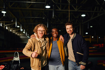 Friends celebrate their weekend adventure at the go kart track for an unforgettable experience