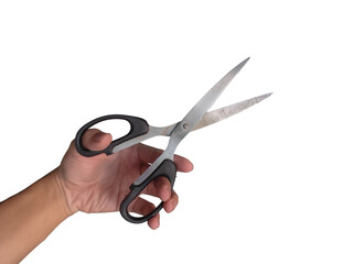 Hand holding an open pair of metal scissors isolated on white background