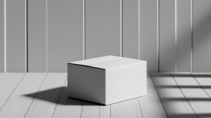 Package arriving home concept, Minimalist white box casting shadows in a light-filled room with wooden walls.