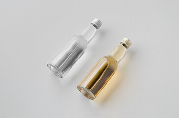 Naklejka premium Miniature spirits, liquor bottle mockup