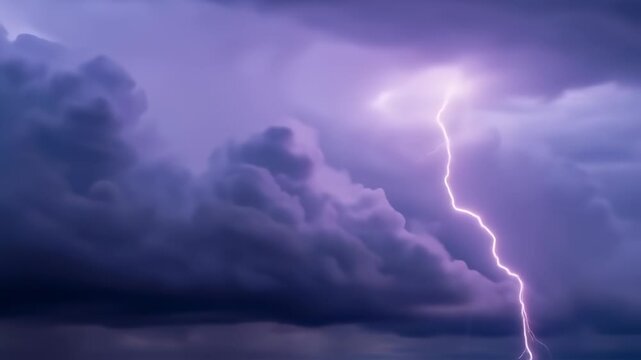 Dramatic lightning strikes through a dark, purple-toned sky filled with dense, rolling clouds