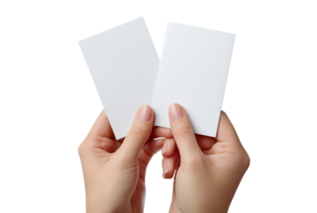 Two blank white paper cards held in hands isolated on transparent background
