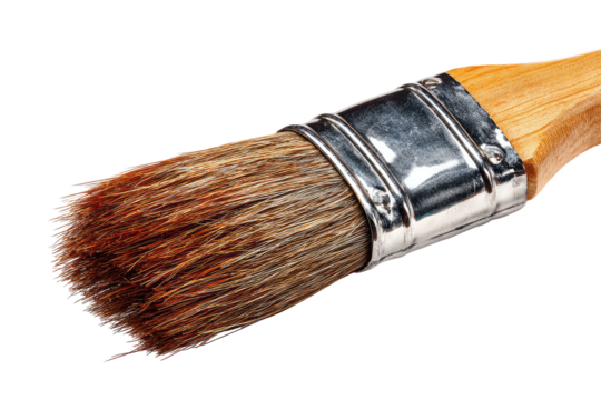 Close-up of a paint brush with natural bristles and a wooden handle isolated on black background