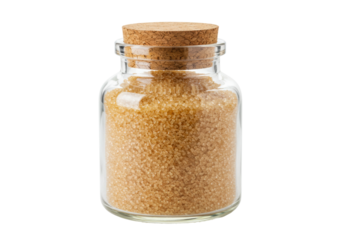 Isolated jar of brown sugar granules with a cork top for cooking and baking purposes