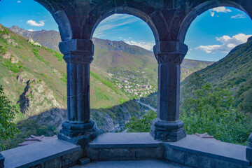 Obraz premium Beautiful arches and a city in nature. Beautiful cityscape and windows. Beautiful architecture with arches. A window to paradise. Church architecture. Alaverdi, Armenia.