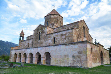 Obraz premium Armenian Church. The Armenian Apostolic Church of Odzun in the Lori region. A monastic complex in the natural setting. The church's beautiful architecture.