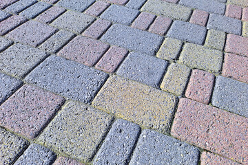 COLORED CONCRETE SELF LOCKING FLOORING BLOCKS - Type of flooring permeable to rain water as required by the building laws