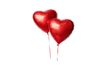 Two red heart-shaped foil balloons floating together, isolated on a transparent background