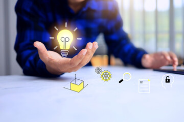 creative concept with a man holding a light bulb represent to create new idea for research and development