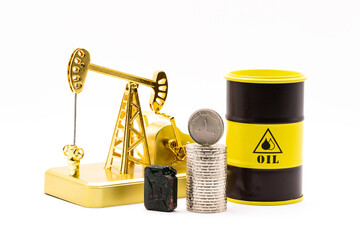 A gold oil pump, an iron oil barrel and a  1 dirham  of the United Arab Emirates coin on a white background