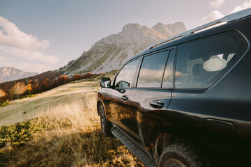 travel by car in mountains. Autumn mountains and forest scenery,