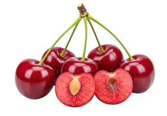 Isolated ripe red cherries with stems in a group two halves with pits in a studio shot