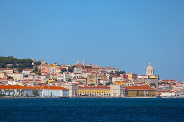 View of famous Alfama neighbourhood of Lisbon, shot from the Tagus river