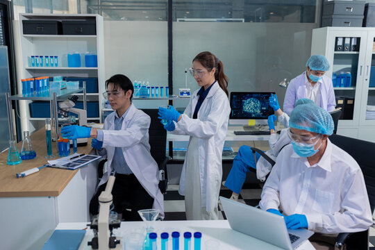 Lab work, Doctor holds a test tube takes the test from a test tube in analysis, blood, DNA, test tube stand.