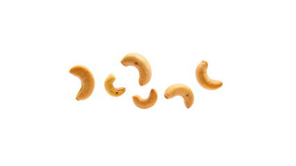 Cashew nuts scattered on transparency background, showcasing their unique shapes and textures, perfect for healthy snacking or culinary use